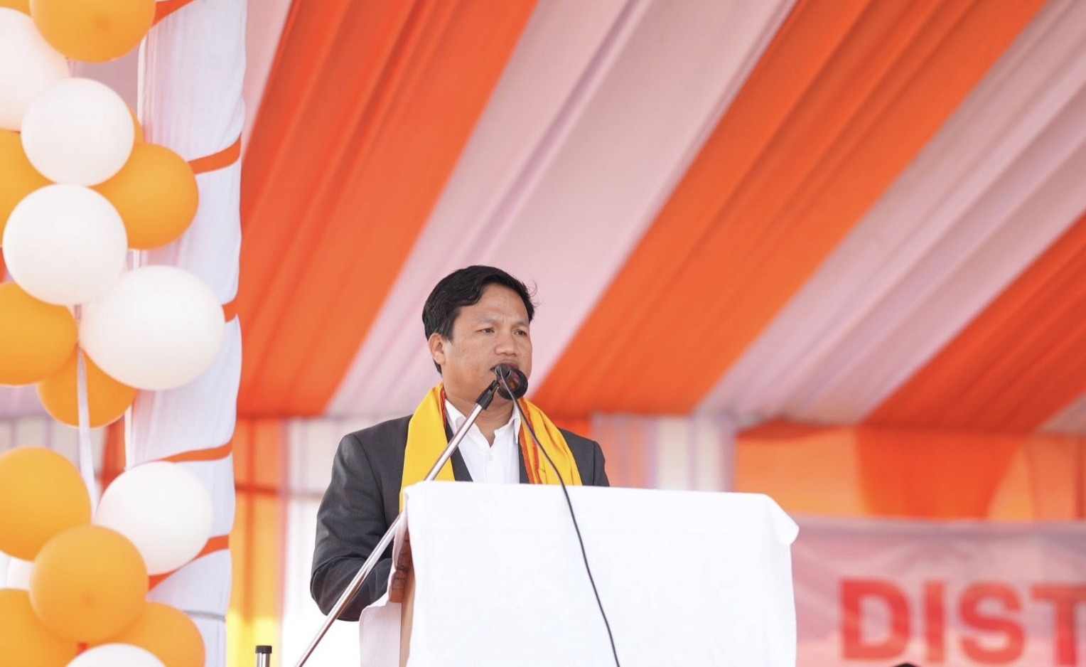 Attending the public meeting and cotton yarn distribution program is DHAC CEM